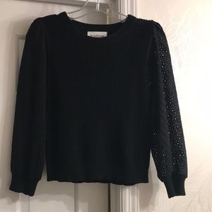 Fitted sweater with eyelet puff sleeves